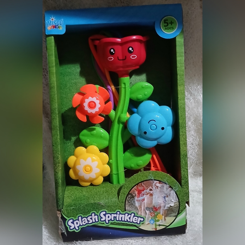 Splash Sprinkler multi color for ages 5+ NWT